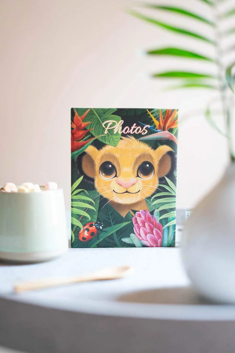 Album fotos Disney El Rey Leon - C fotos 10x15cm con 100 bolsillos - Album de fotos tapa dura 16,5x12,5 cm - Producto con licencia oficial