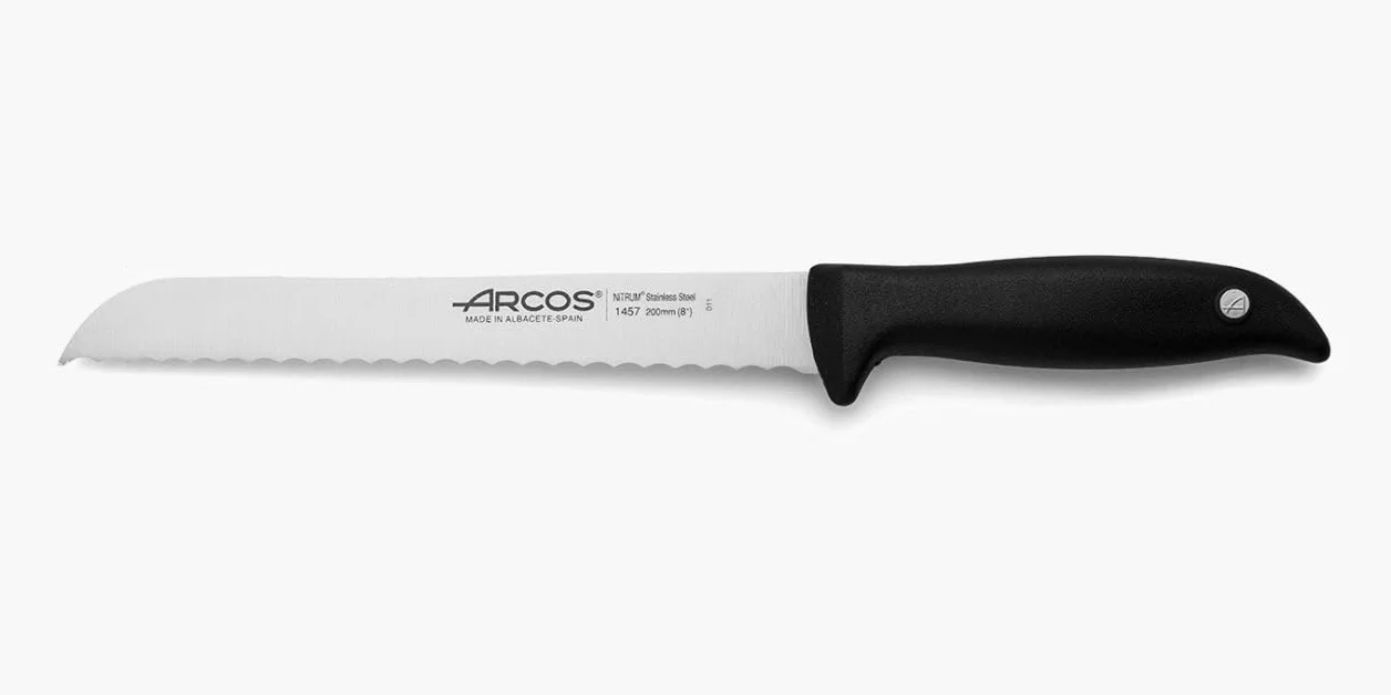 Arcos Cuchillo para pan con Hoja Acero Inoxidable Nitrum 200 mm. Obtenga una gran variedad cortes parau comida. Cuchillo ideal para uso doméstico diario. Serie Menorca. Color negro.