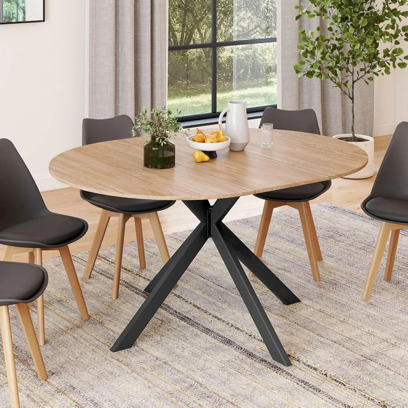 IDMarket Alix - Mesa de comedor extensible redonda 4-8 personas, patas de araña madera y negro, 110-150 cm