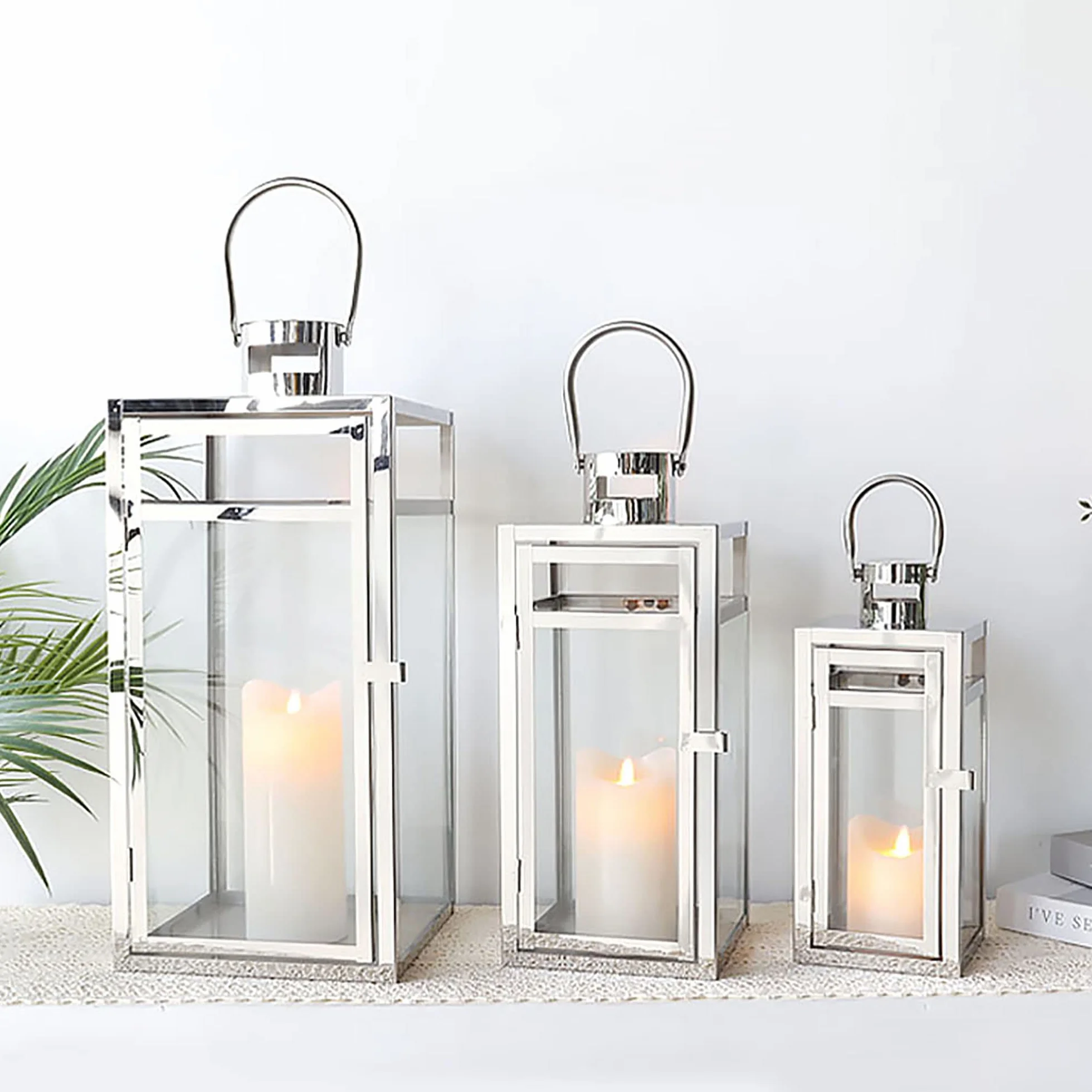 TRIROCKS Set de 3 Faroles Decorativos de Acero Inoxidable 48/38/30 cm Altos, Soportes Colgantes de Metal con Vidrio Transparente para Sala, Mesa y Exterior (Plata)