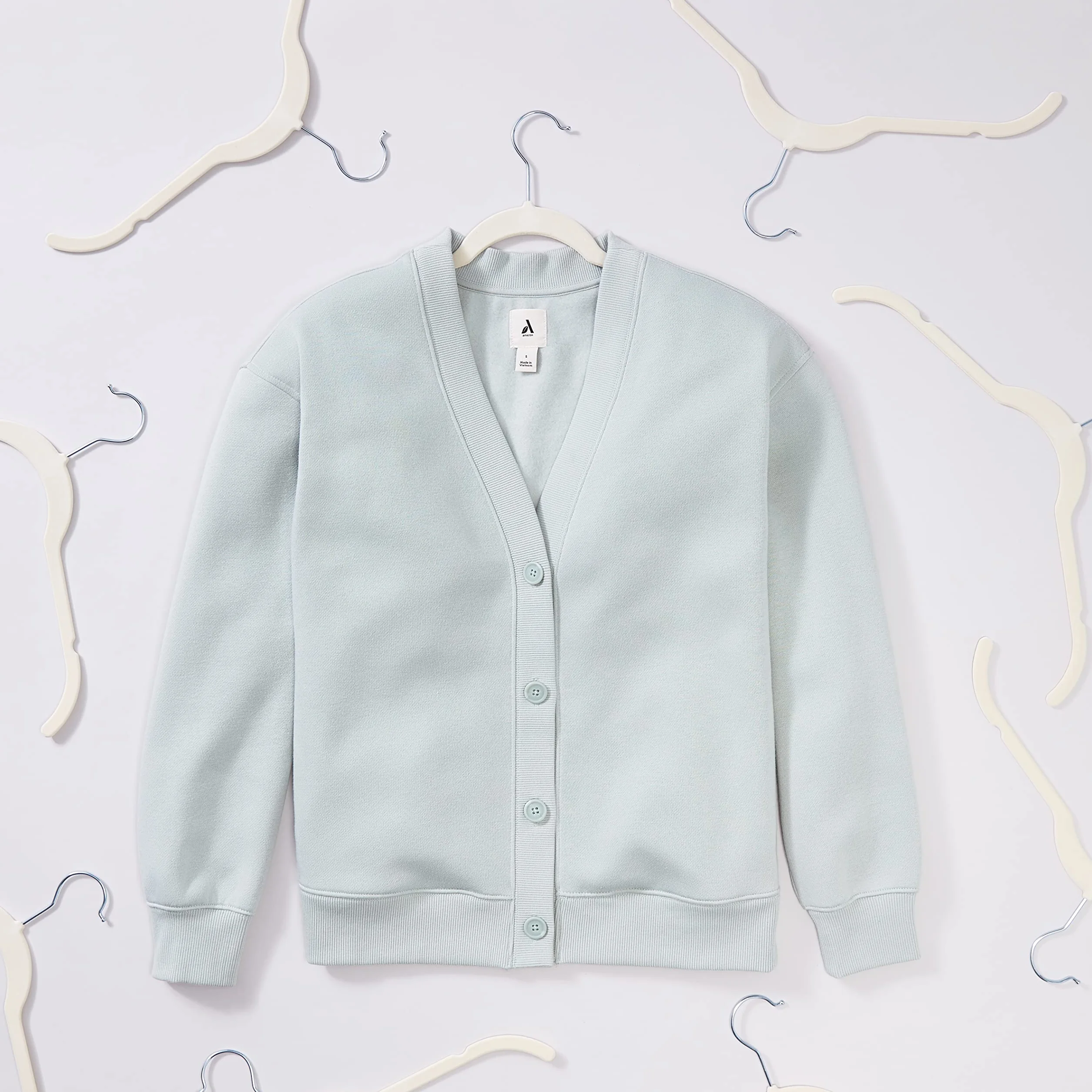 Amazon Basics Perchas de terciopelo para camisas/vestidos - Paquete de 50, Marfil
