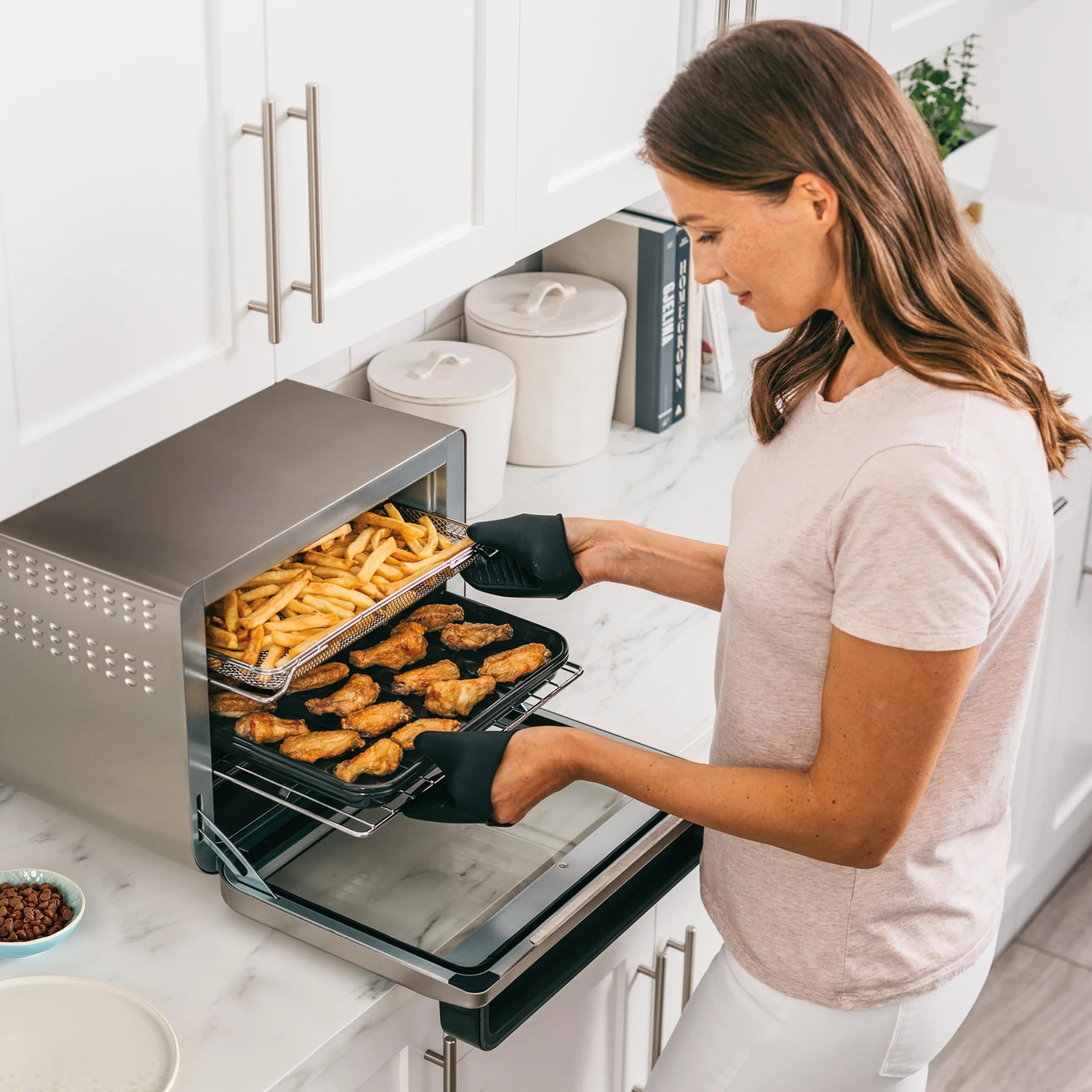 Ninja Foodi Horno multifunción 10 en 1, Mini horno portátil para encimeras y superficies de trabajo, 10 funciones de cocción, Freír con aire, Asar, Parrilla, Hornear y más, en plata y negro, DT200EU