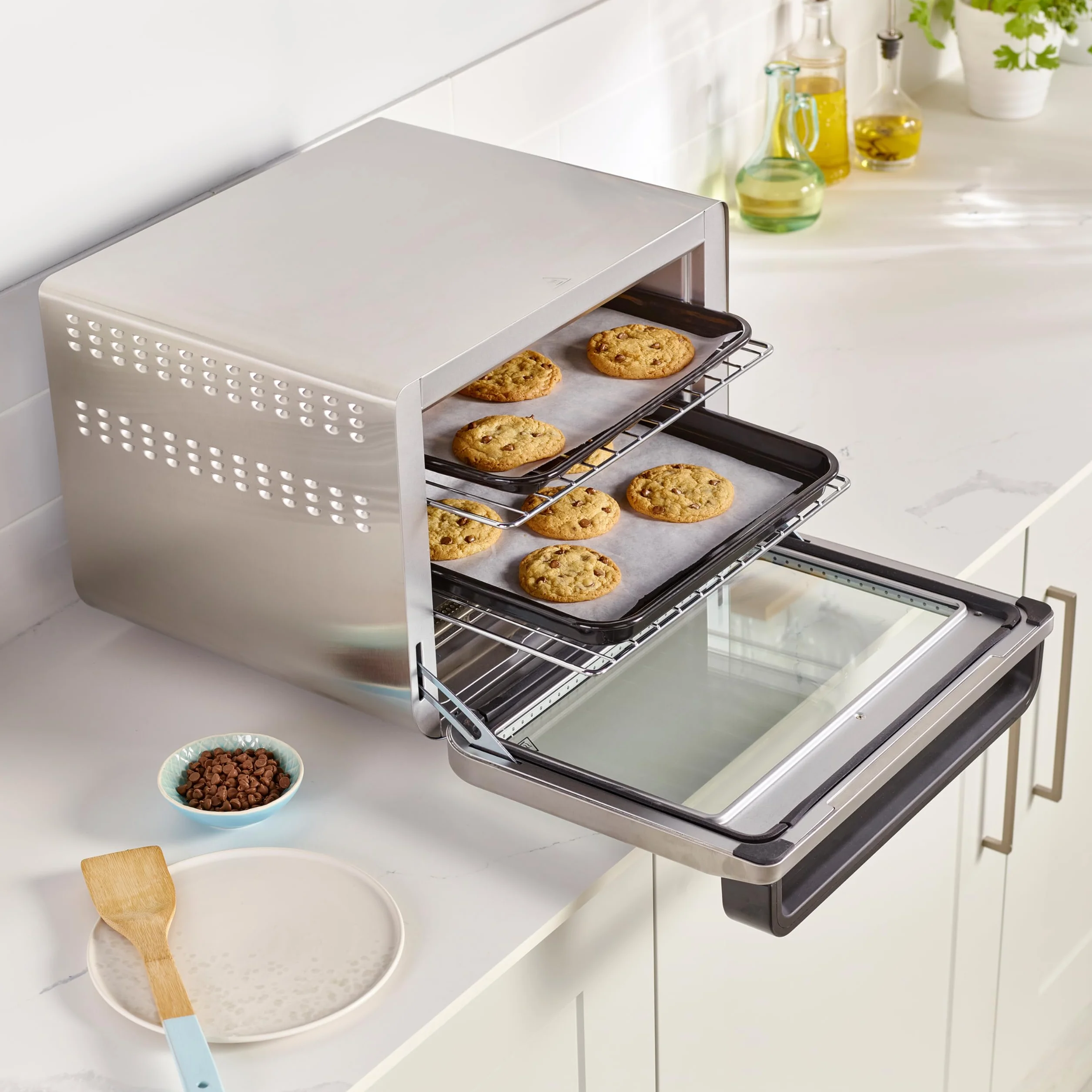 Ninja Foodi Horno multifunción 10 en 1, Mini horno portátil para encimeras y superficies de trabajo, 10 funciones de cocción, Freír con aire, Asar, Parrilla, Hornear y más, en plata y negro, DT200EU