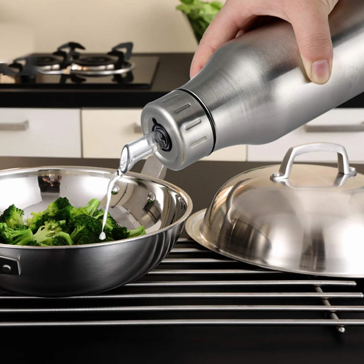 Botella dispensadora de aceite de acero inoxidable