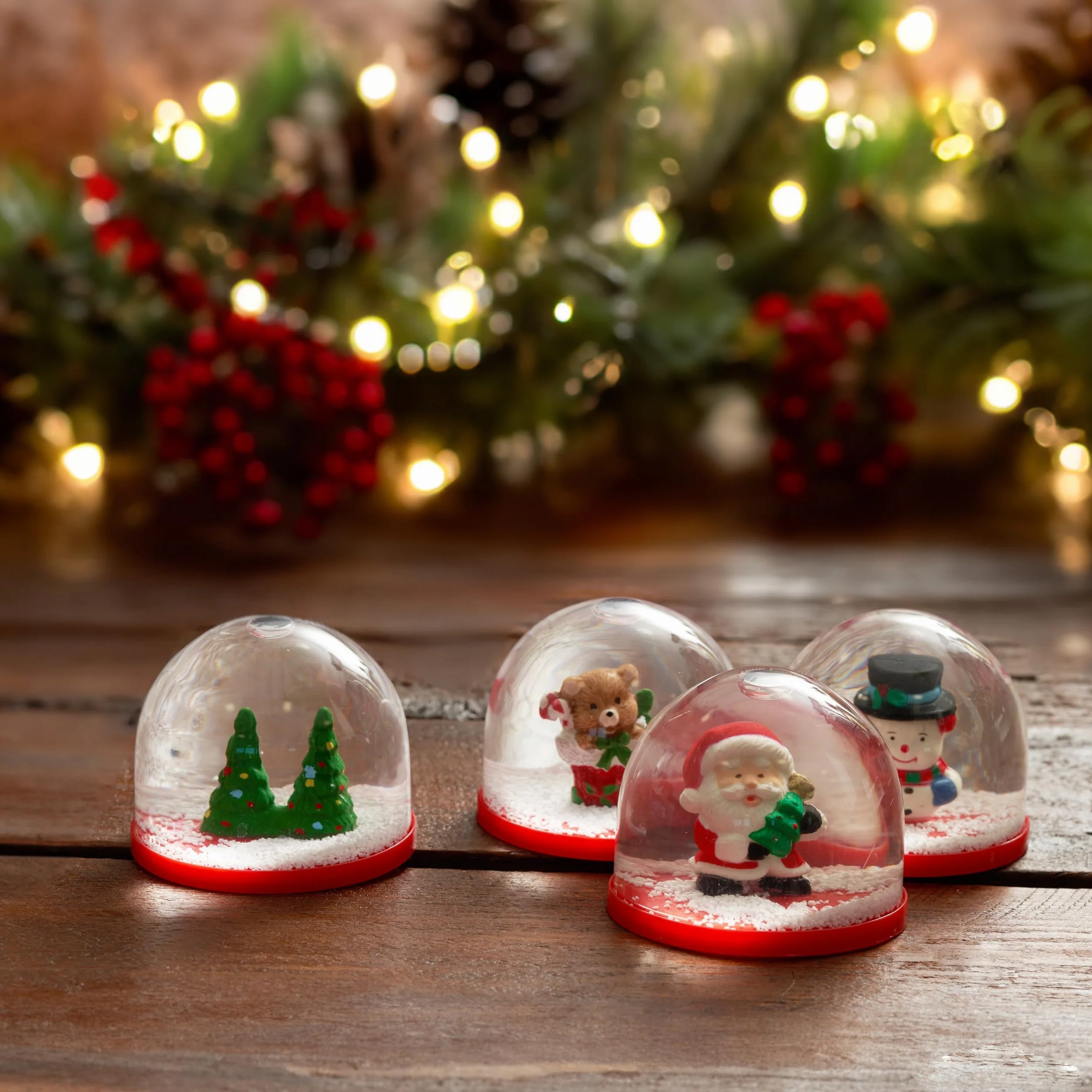 4 Mini Globos de Nieve Navideños 5cm Surtido Diseños Festivos