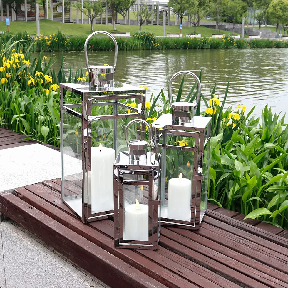 TRIROCKS Set de 3 Faroles Decorativos de Acero Inoxidable 48/38/30 cm Altos, Soportes Colgantes de Metal con Vidrio Transparente para Sala, Mesa y Exterior (Plata)