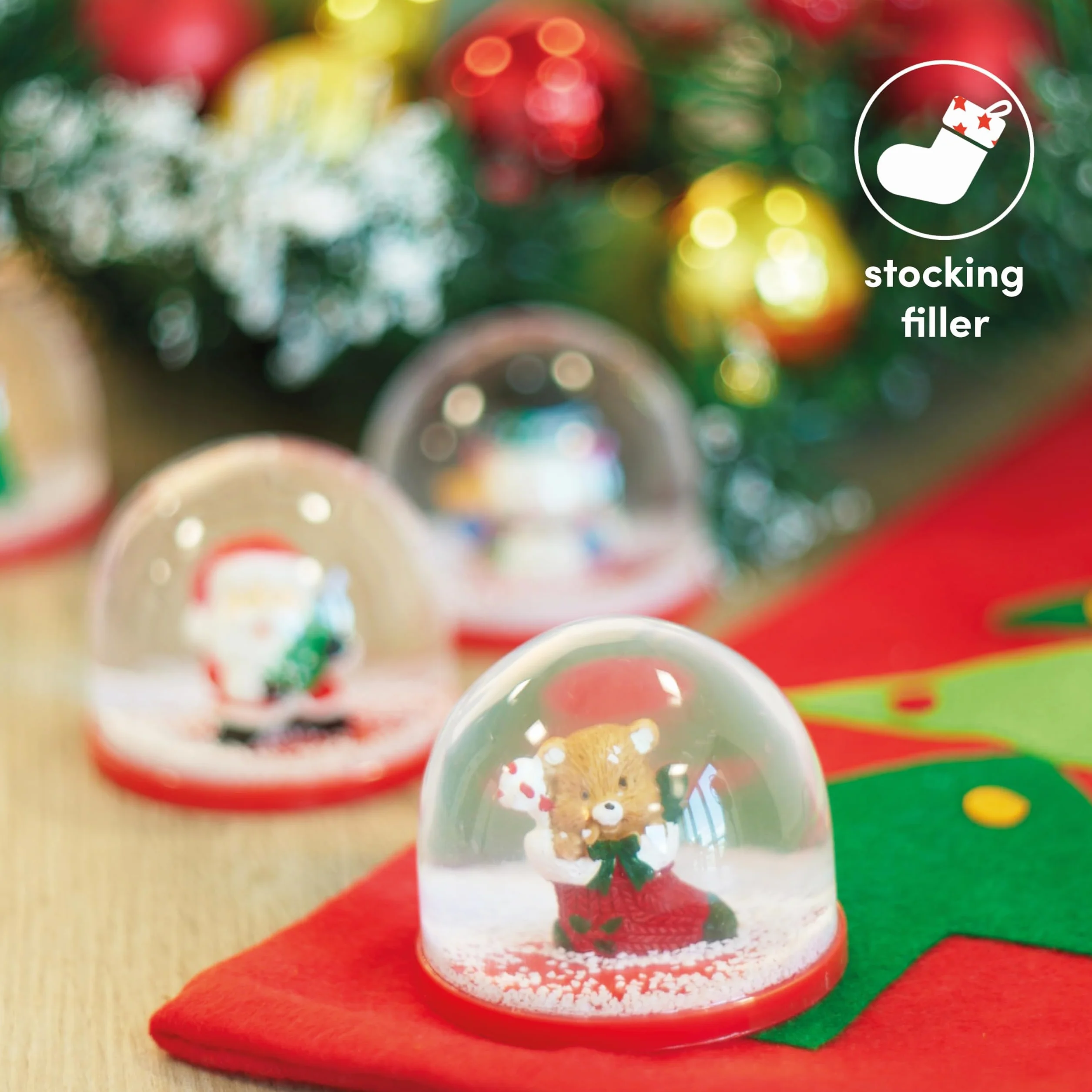 4 Mini Globos de Nieve Navideños 5cm Surtido Diseños Festivos